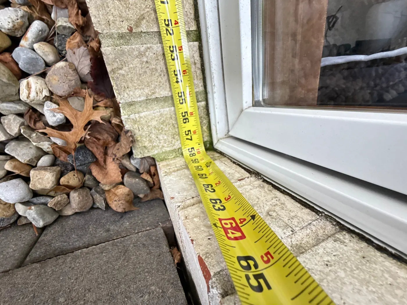 Storm-damaged window documented in Crooked Stick